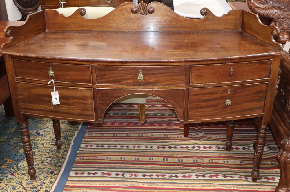 A Regency mahogany bow-fronted sideboard, W.144cm, D.52cm, H.82cm